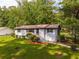 Charming single-story house with a well-manicured lawn and inviting curb appeal at 5207 Dixie Lake Rd, Union City, GA 30291