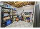 Organized storage room with shelving, work table and tiled floors at 569 Fairway Dr, Woodstock, GA 30189