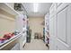 Well-organized walk-in closet with shelves and storage for toys and clothes at 569 Fairway Dr, Woodstock, GA 30189