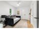 Bright bedroom featuring neutral walls, a ceiling fan, and a comfortable daybed with stylish pillows at 1494 May Se Ave, Atlanta, GA 30316