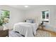 Bright bedroom with hardwood floors, a ceiling fan, and two windows providing natural light at 1494 May Se Ave, Atlanta, GA 30316