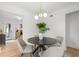 Modern dining space with a stylish table set, contemporary lighting, and bright walls at 1494 May Se Ave, Atlanta, GA 30316