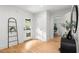 Bright entryway with modern light fixtures, wood flooring, and a decorative ladder at 1494 May Se Ave, Atlanta, GA 30316