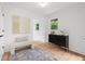 Inviting hallway with neutral colors, stylish furniture, and an abundance of natural light at 1494 May Se Ave, Atlanta, GA 30316