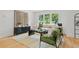 Bright living room with hardwood flooring and a view of the exterior at 1494 May Se Ave, Atlanta, GA 30316