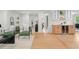 Bright living room featuring hardwood floors, accent chairs, and modern decor at 1494 May Se Ave, Atlanta, GA 30316