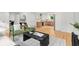 Spacious living room leading into the kitchen featuring hardwood floors and modern decor at 1494 May Se Ave, Atlanta, GA 30316