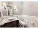 Stylish half bathroom with elegant fixtures and a vessel sink at 157 Lake Forrest Ne Ln, Atlanta, GA 30342