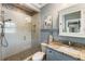 Bathroom featuring a walk-in shower and granite countertop at 157 Lake Forrest Ne Ln, Atlanta, GA 30342