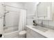 Bathroom with white subway tiles in the shower and a marble vanity at 157 Lake Forrest Ne Ln, Atlanta, GA 30342