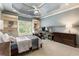 Bedroom featuring a trey ceiling and built in shelves at 157 Lake Forrest Ne Ln, Atlanta, GA 30342