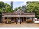Rustic building exterior with a charming, old-fashioned storefront design at 157 Lake Forrest Ne Ln, Atlanta, GA 30342