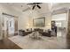 Spacious living room featuring a large sectional sofa, neutral color palette, and hardwood floors at 157 Lake Forrest Ne Ln, Atlanta, GA 30342