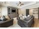 Comfortable living room with neutral decor and wall unit at 157 Lake Forrest Ne Ln, Atlanta, GA 30342