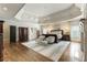 Beautiful primary bedroom with hardwood floors and tray ceiling at 157 Lake Forrest Ne Ln, Atlanta, GA 30342