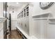 Mudroom features built-in cabinets, a bench, and ample storage space at 157 Lake Forrest Ne Ln, Atlanta, GA 30342