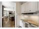 Bright office nook with custom cabinets and granite countertops at 157 Lake Forrest Ne Ln, Atlanta, GA 30342