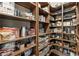 Walk-in pantry with custom shelving and organized storage solutions at 157 Lake Forrest Ne Ln, Atlanta, GA 30342