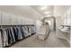 Large walk-in closet with custom shelving and storage at 157 Lake Forrest Ne Ln, Atlanta, GA 30342