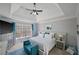 Bright bedroom with a tray ceiling, large window, and stylish decor at 2995 Barimore, Dacula, GA 30019