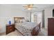 Comfortable bedroom featuring a ceiling fan and a window providing natural light at 2995 Barimore, Dacula, GA 30019