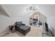 Attic bonus room with a lounge area, a study area, and a sloped ceiling at 2995 Barimore, Dacula, GA 30019
