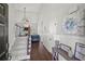 Elegant foyer with hardwood floors and staircase leading to the upper level at 2995 Barimore, Dacula, GA 30019