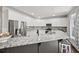 Spacious kitchen with granite countertops, stainless steel appliances, and large center island at 2995 Barimore, Dacula, GA 30019