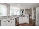 Kitchen featuring granite countertops, stainless steel appliances, white cabinets, and breakfast nook at 2995 Barimore, Dacula, GA 30019