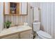 Traditional half bathroom featuring a vanity and toilet at 347 Oakhurst Dr, Marietta, GA 30066