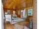 Living room with wood floors, built-in shelves, and neutral-toned furniture at 347 Oakhurst Dr, Marietta, GA 30066