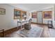 Bright office with three windows, a white desk, and a wicker chair at 347 Oakhurst Dr, Marietta, GA 30066