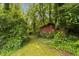 Secluded storage shed surrounded by lush greenery at 347 Oakhurst Dr, Marietta, GA 30066