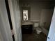 Small bathroom with a single sink vanity and a combination shower and tub at 1120 Northern Run, Stockbridge, GA 30281