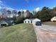 Charming ranch style home with a two-car garage and mature trees in a quiet suburban neighborhood at 1120 Northern Run, Stockbridge, GA 30281