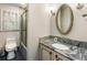 Bathroom featuring shower, toilet and vanity with drawers at 11270 Stroup Road, Roswell, GA 30075