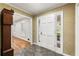 Welcoming foyer with neutral walls and a glimpse into the adjacent living spaces at 11270 Stroup Road, Roswell, GA 30075