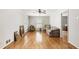 Bright living room features wood floors, neutral paint and great natural light at 11270 Stroup Road, Roswell, GA 30075