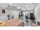 Finished basement featuring neutral walls, vinyl floors, and recreational and entertainment space at 1637 Willow Way, Woodstock, GA 30188