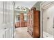 Bathroom featuring a shower stall and a wooden armoire for linens and toiletries at 1637 Willow Way, Woodstock, GA 30188