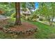 Lush lawn and landscaping surround this charming home in a quiet neighborhood at 1637 Willow Way, Woodstock, GA 30188