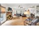 Spacious living room features a stone fireplace, hardwood floors, and lots of natural light at 1637 Willow Way, Woodstock, GA 30188