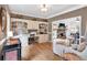 Cozy living room with fireplace, built-ins, and hardwood flooring at 1637 Willow Way, Woodstock, GA 30188