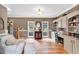 Bright living room with hardwood floors, built-in cabinets, and natural light at 1637 Willow Way, Woodstock, GA 30188