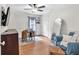 Functional office space features a desk, comfortable chair, and ample natural light at 1637 Willow Way, Woodstock, GA 30188