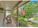 Relaxing front porch with rocking chairs offers a serene outdoor space at 1637 Willow Way, Woodstock, GA 30188