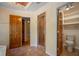 Primary bathroom featuring a glass shower, toilet room, and vanity area at 2390 Sassafrass Ln, Powder Springs, GA 30127