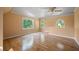 Upper level room with hardwood floors, natural light, and great ceiling height at 2390 Sassafrass Ln, Powder Springs, GA 30127