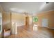 Upstairs hallway features hardwood floors, natural light, and great ceiling height at 2390 Sassafrass Ln, Powder Springs, GA 30127