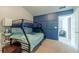Cozy bedroom featuring a bunk bed and adjacent doorway, perfect for a room or guest suite at 3255 Clear View Dr, Snellville, GA 30078